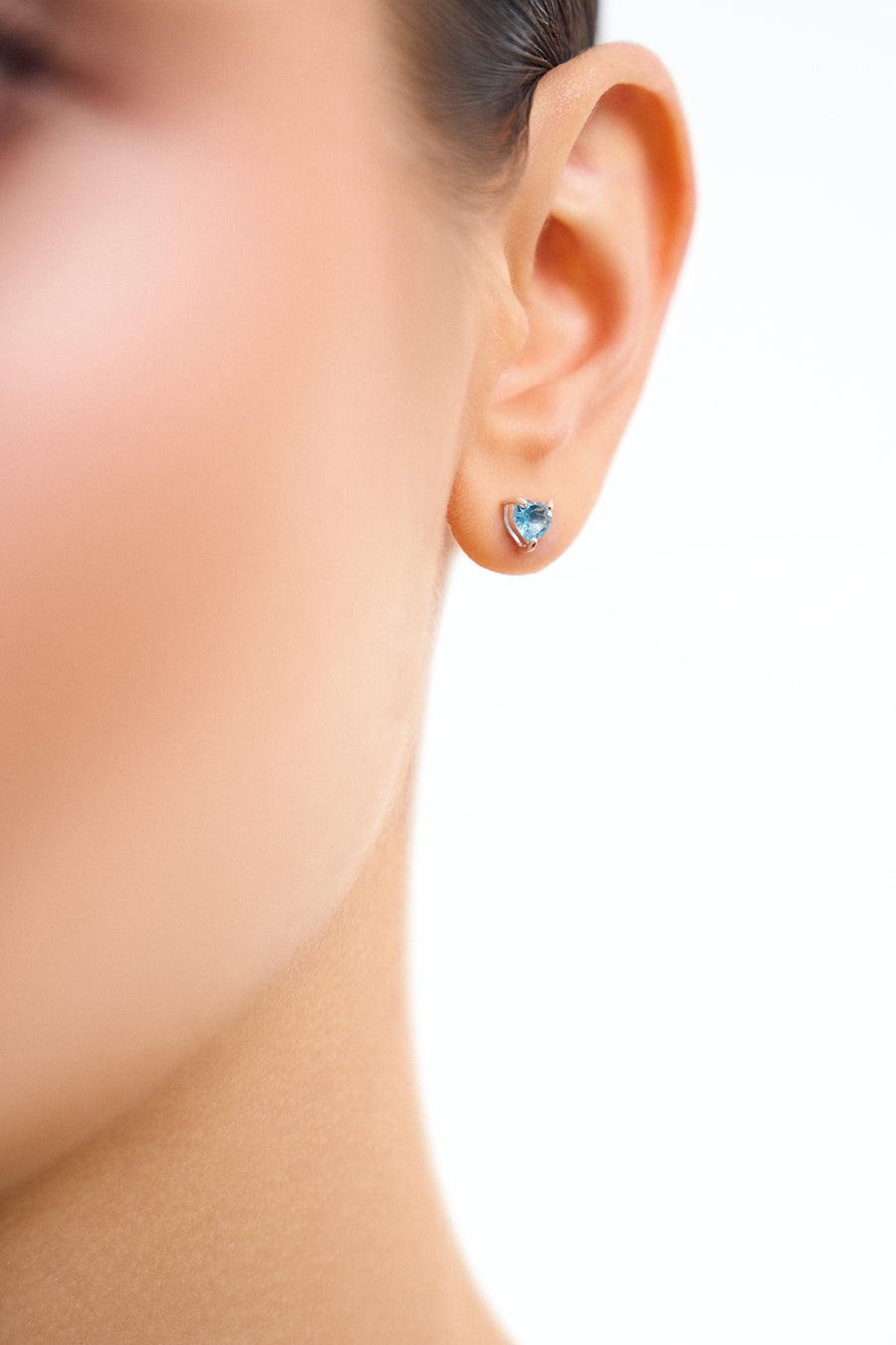 Blue topaz heart stud earrings