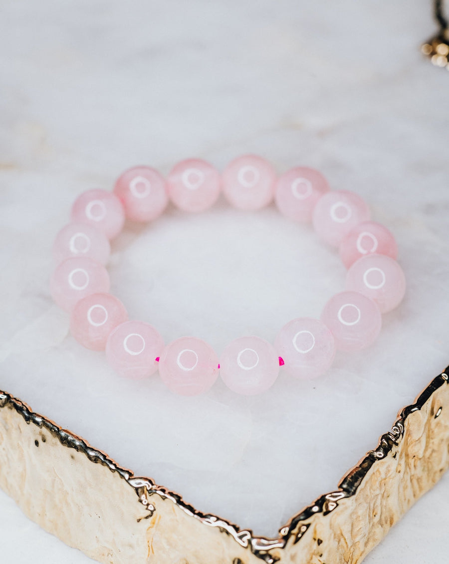 Bracelet en perles de quartz rose de 12 mm