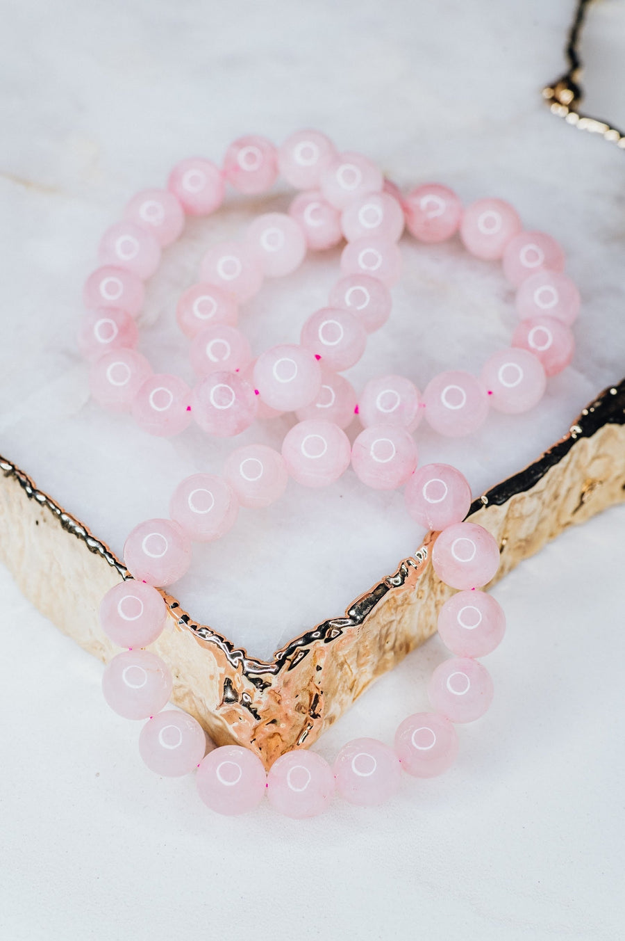 Bracelet en perles de quartz rose de 12 mm